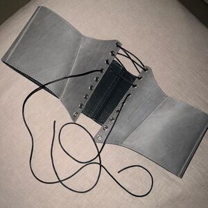 Leather belt-corset.